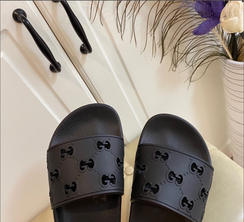 Guccii1 black rubber